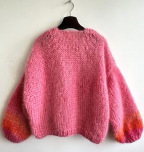 roze gebreid vest