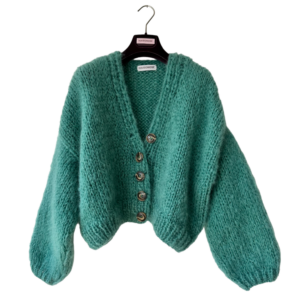 Kort en oversized damesvest met knopen in azur groen